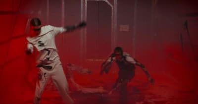 a man in a white suit and a man in a white suit in a red