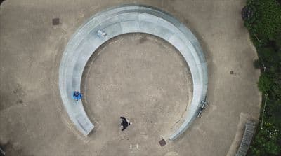 an aerial view of a circular concrete structure