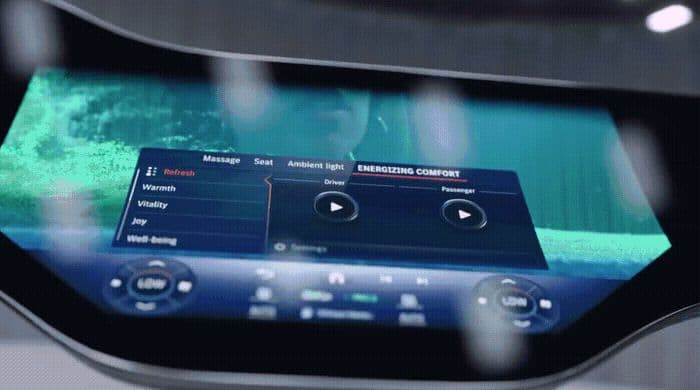 a close up of a computer screen with a person in the background