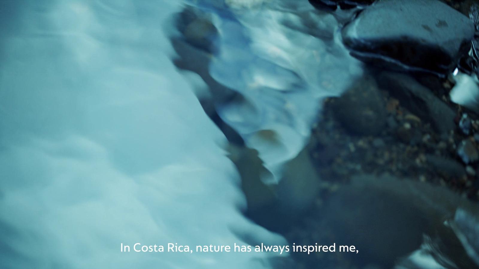a blurry image of rocks in the water