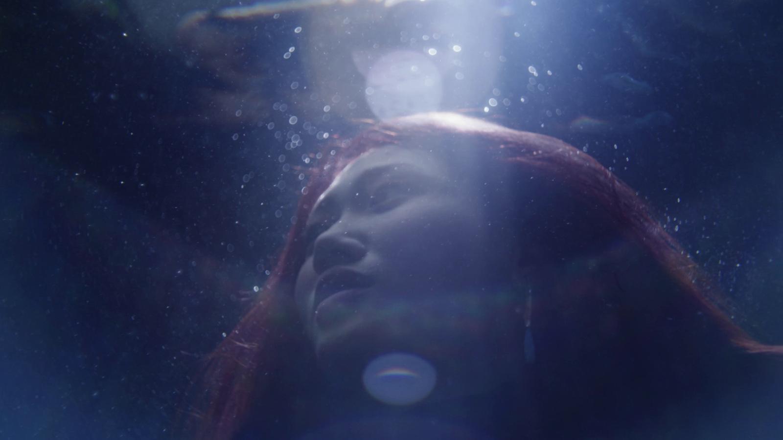 a close up of a person under water