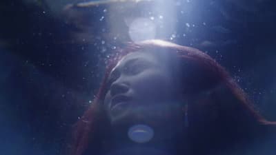 a close up of a person under water
