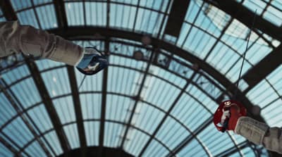 a view of the ceiling of a train station