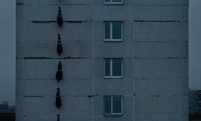 a tall building with a clock on the side of it