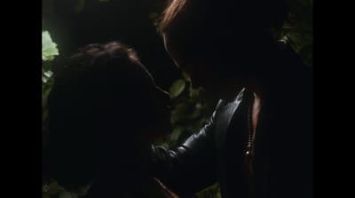 a man and a woman standing next to each other