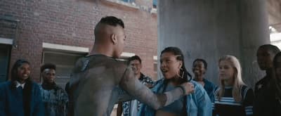 a group of people standing next to each other