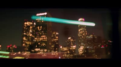 a blurry picture of a city at night