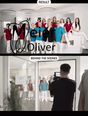 a group of people standing in front of a mirror