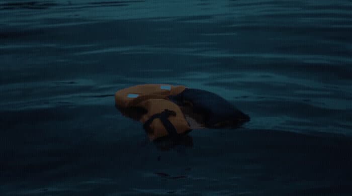 an inflatable raft floating in a body of water