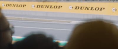 a blurry photo of a person holding a cell phone