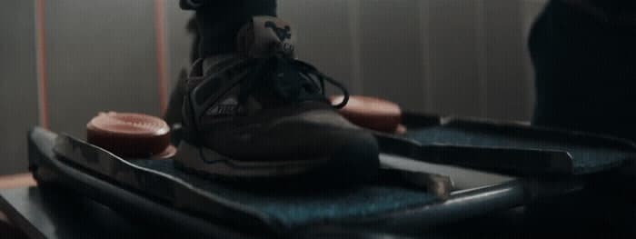 a pair of shoes sitting on top of a metal tray