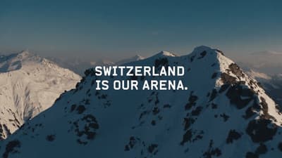 a snowy mountain with a quote written on it