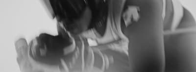 a blurry photo of a woman with long hair