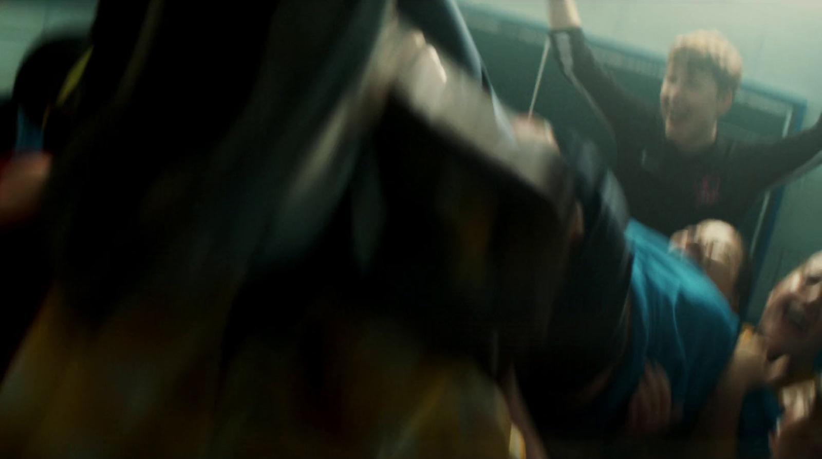 a blurry photo of a person hanging upside down