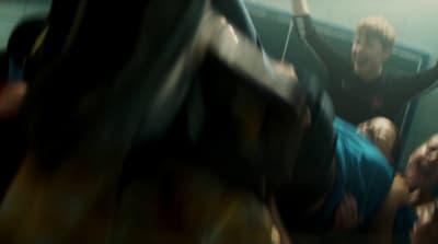 a blurry photo of a person hanging upside down