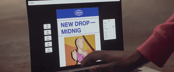 a person using a laptop computer with a picture of a woman on the screen