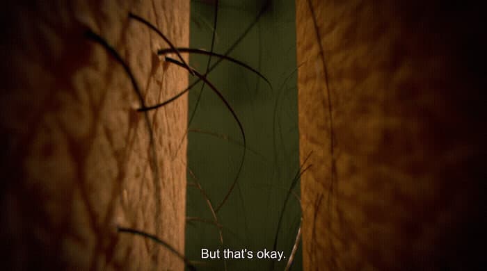 a blurry photo of a wall with a quote on it