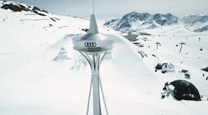 a view of a ski resort with a mountain in the background