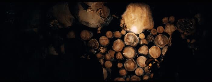 a bunch of logs stacked on top of each other