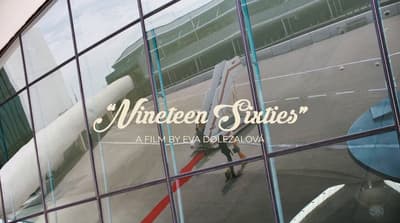 a reflection of a plane in a glass window