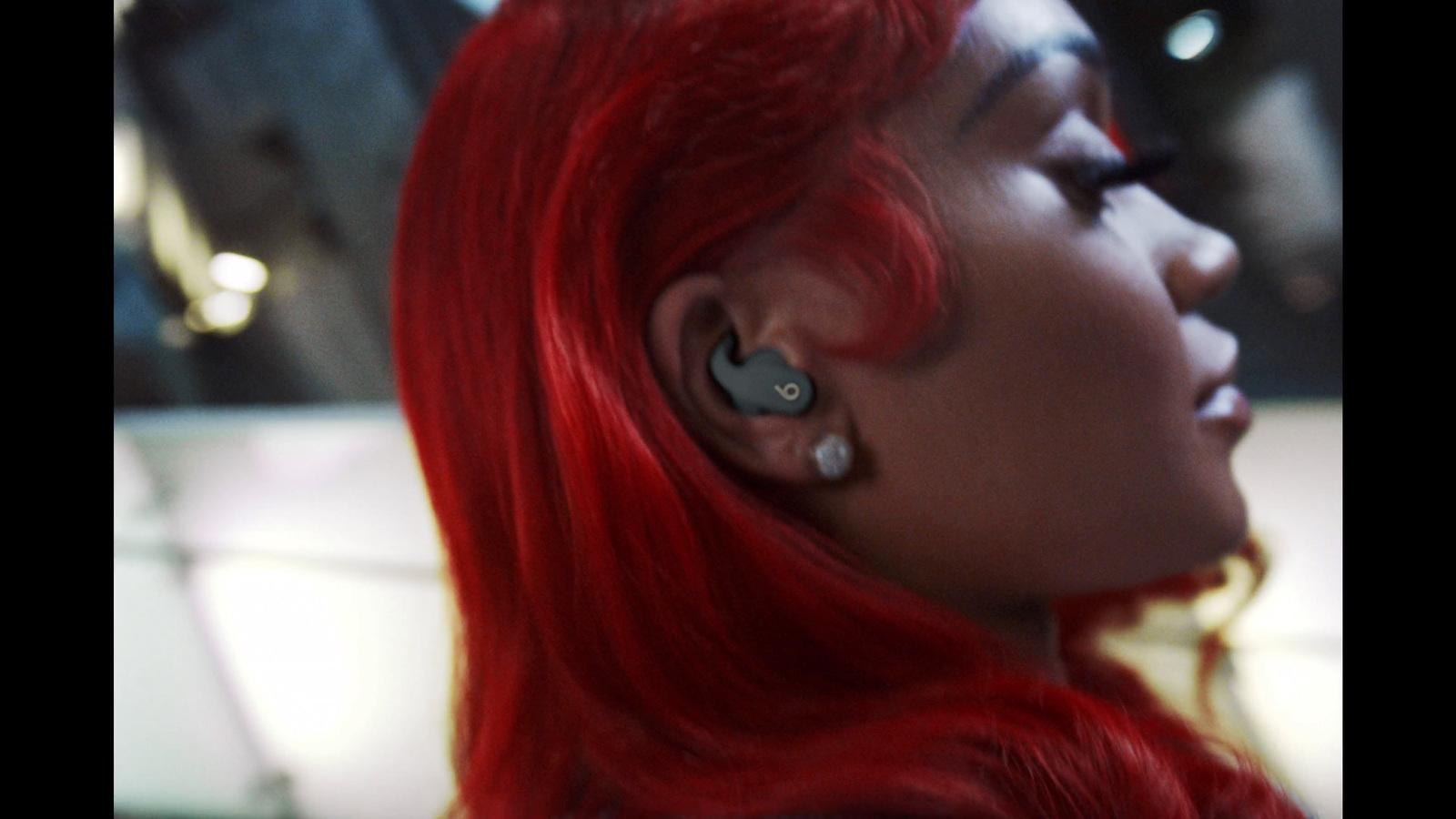 a close up of a person with red hair