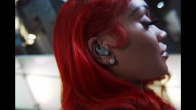 a close up of a person with red hair