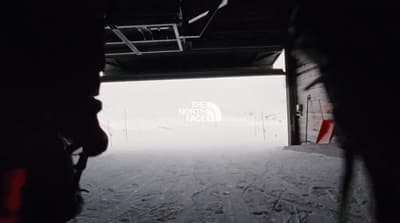 the north face logo is seen through a tunnel
