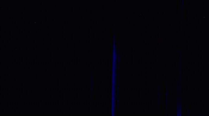 a black background with blue lines in the middle