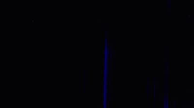 a black background with blue lines in the middle