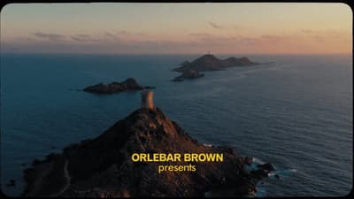 an aerial view of an island with a castle on top of it