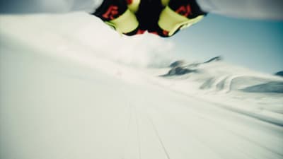 a snowboarder is doing a trick in the air