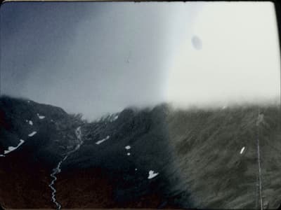 a black and white photo of a mountain