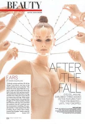 a magazine cover with a woman's face and hands
