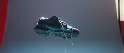a pair of shoes hanging from a string