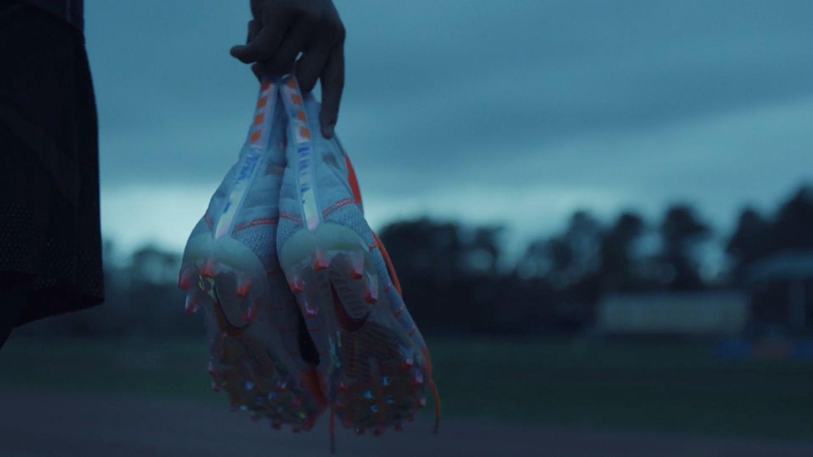 a person holding two bags of something in their hand