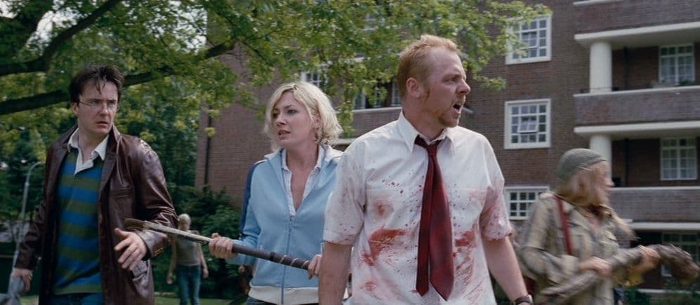 a group of people with blood on their bodies
