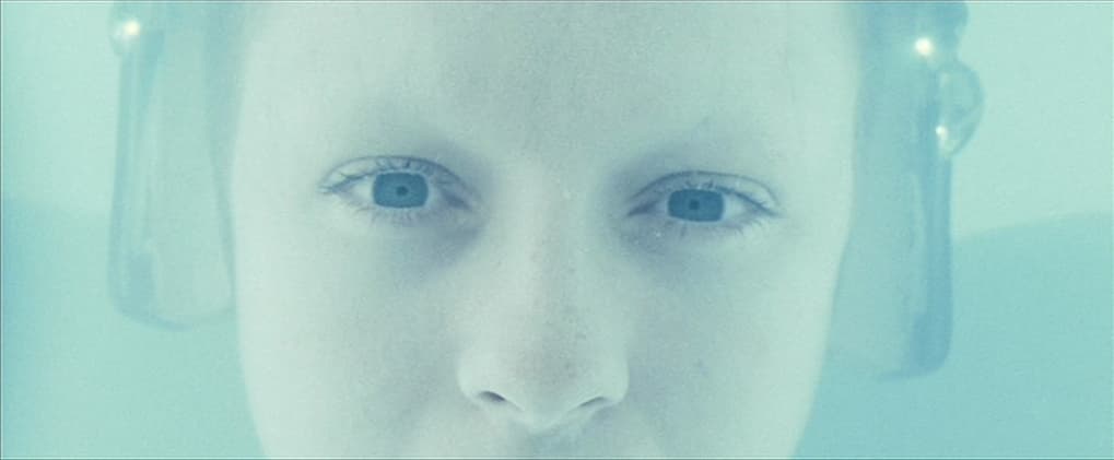 a close up of a person with headphones on