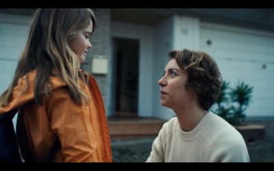 a young girl and a young boy standing outside of a house