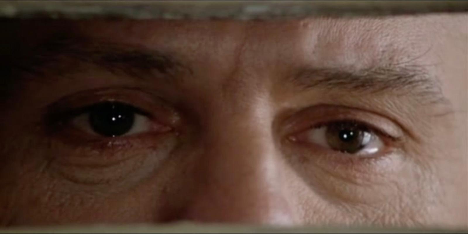 a close up of a person's eye with a blurry background