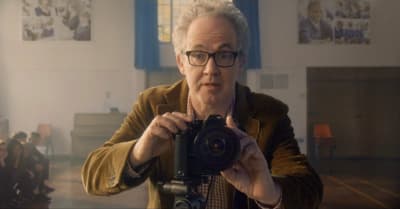 a man taking a picture of himself with a camera