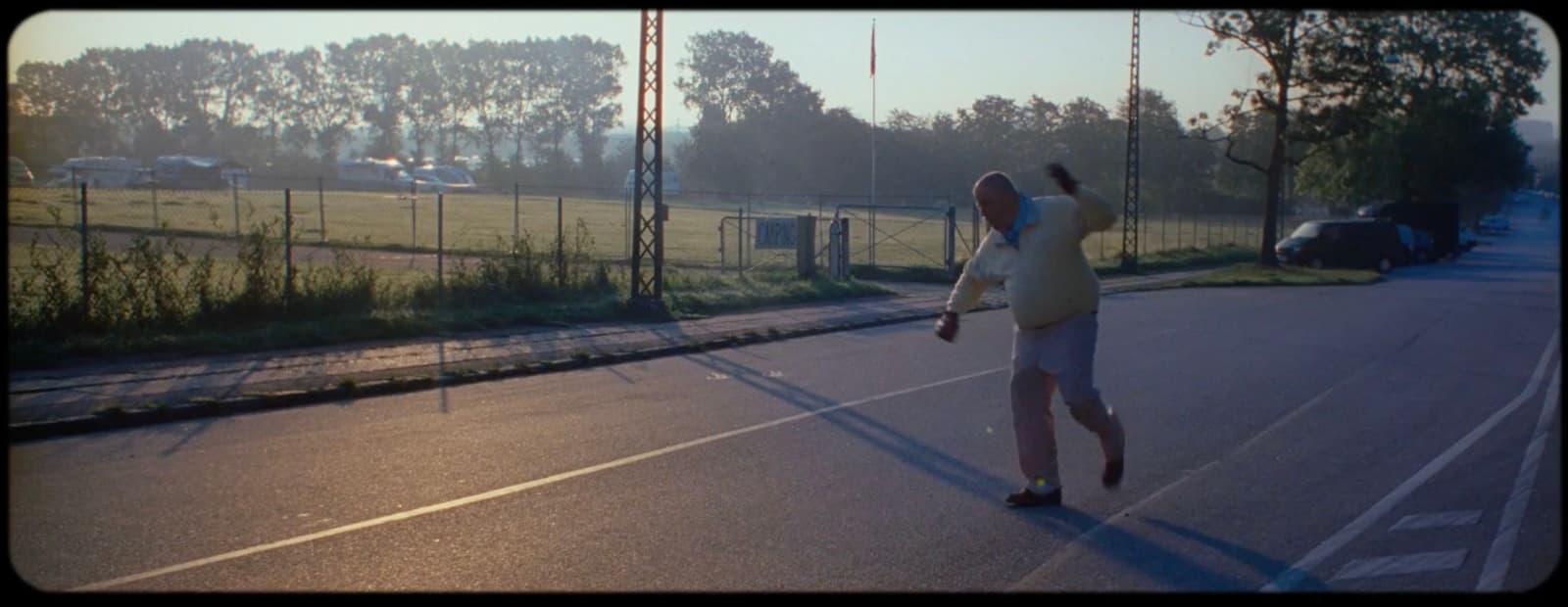 a person on a tennis court with a racket