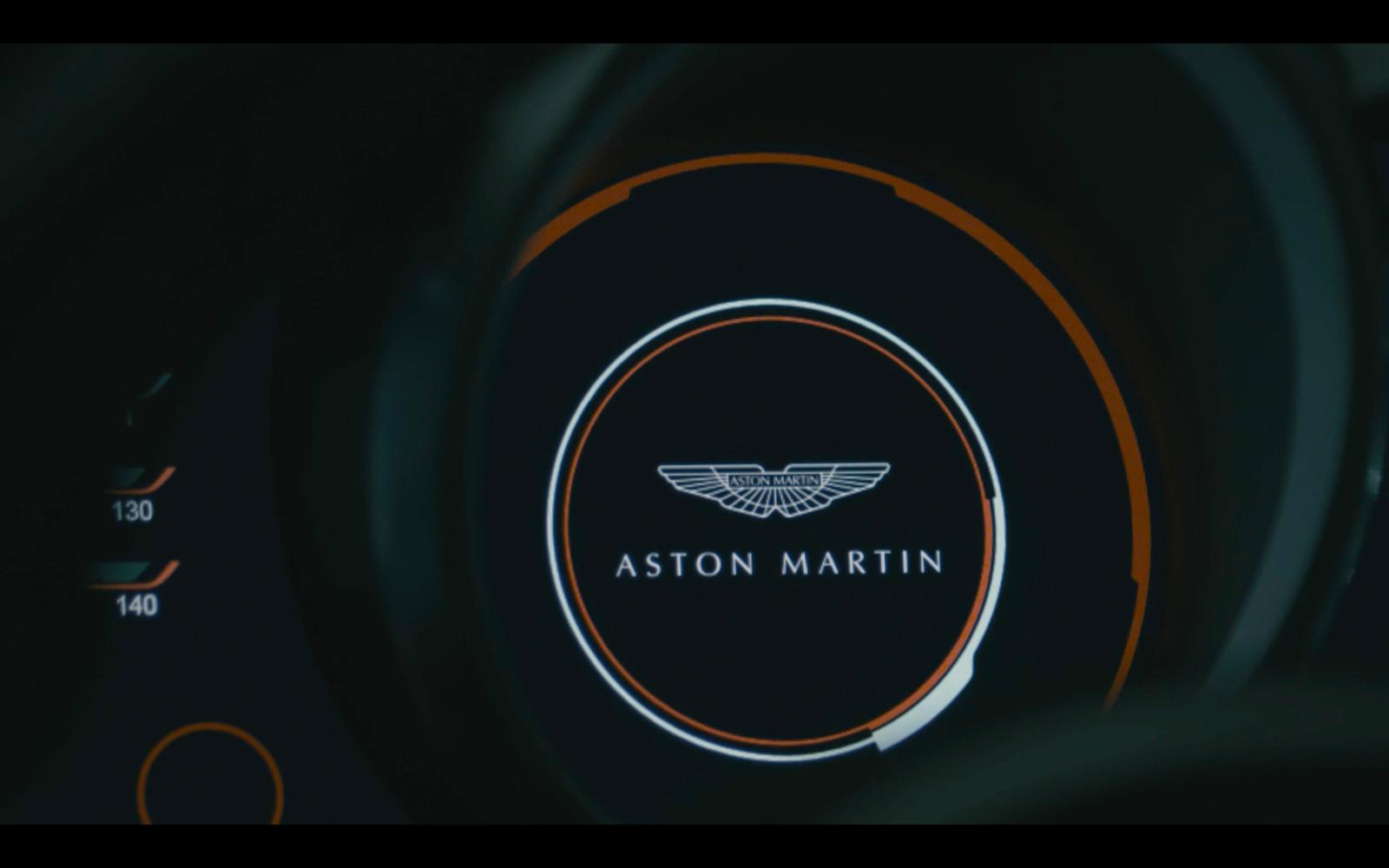 a close up of a steering wheel with a logo on it