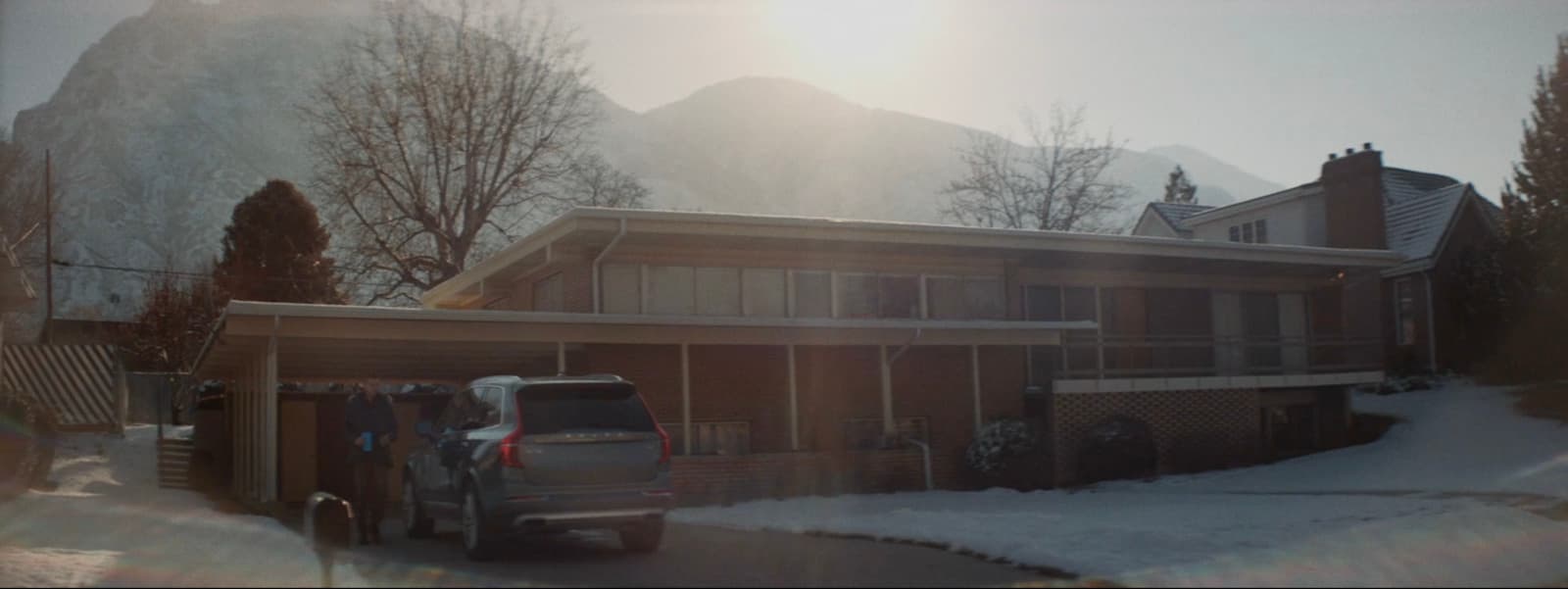 a truck is parked in front of a house