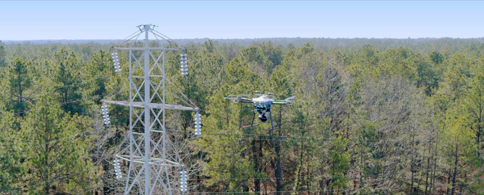 a man on a ski lift in the middle of a forest