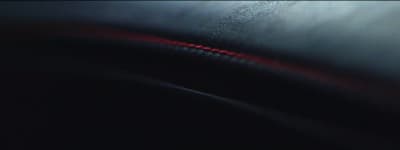 a blurry image of a red light in the dark