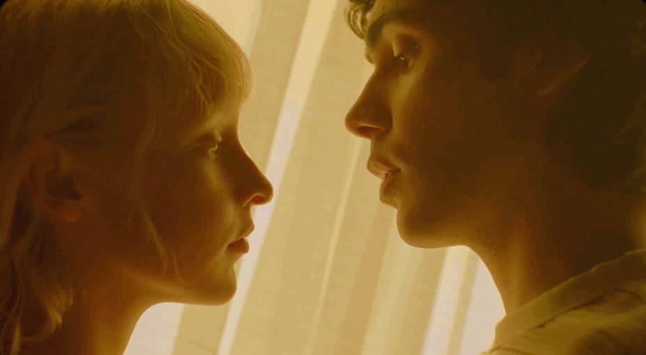 a man and a woman staring at each other