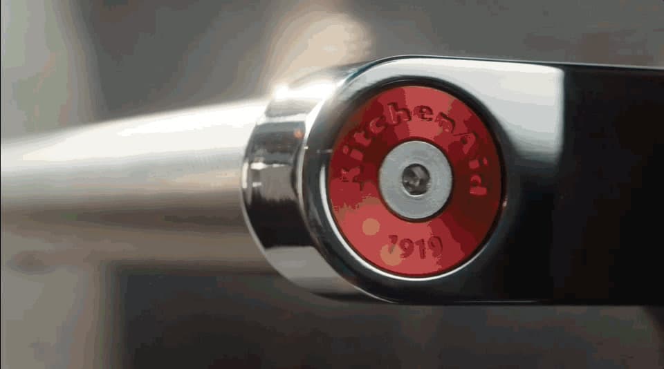 a close up of a red and black bike handle