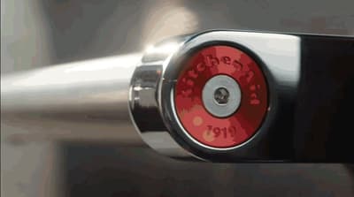 a close up of a red and black bike handle