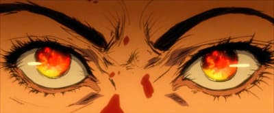 a close up of a person's eyes with a red eye