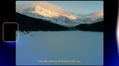 a picture of a snow covered mountain with a sky background